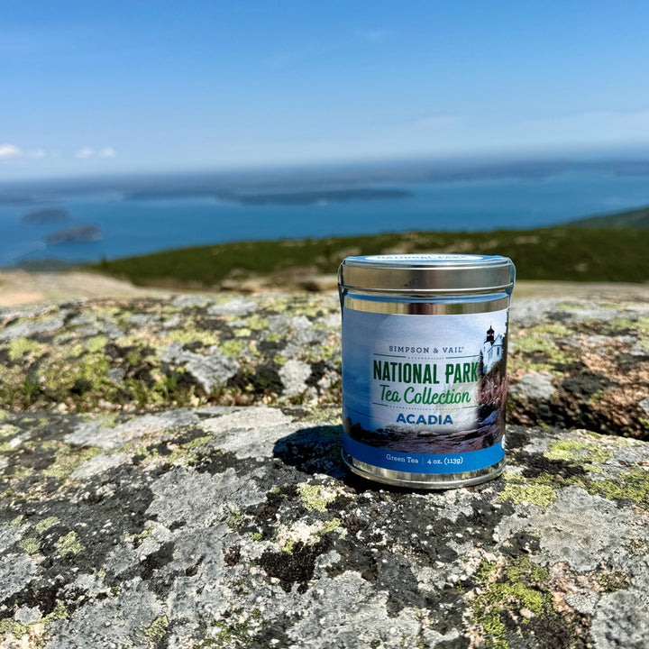 Picture at Acadia National Park with a tin of Acadia green tea