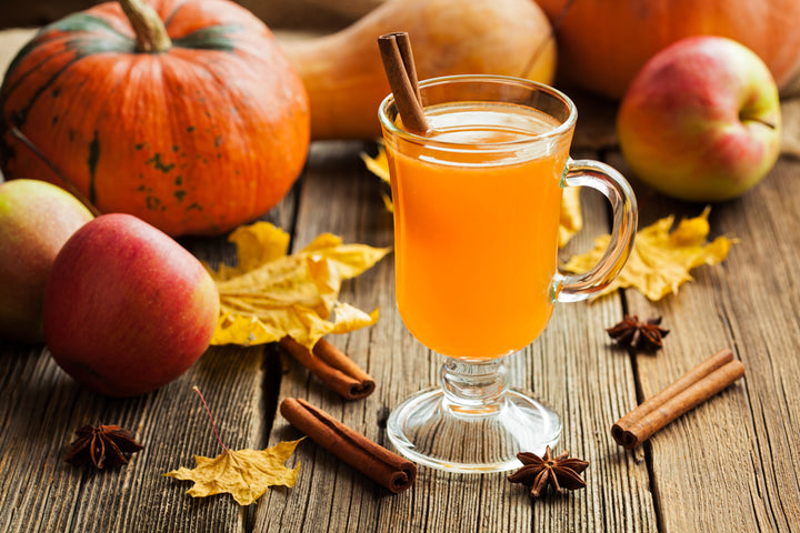Brewed Mulling Spice with Cinnamon Sticks and Fall Scene