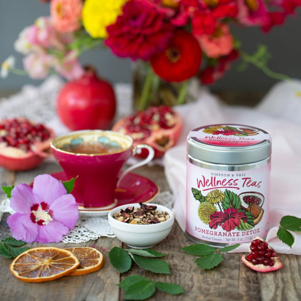 Pomegranate Detox Tea Scene w/ Flowers and Dried Fruit