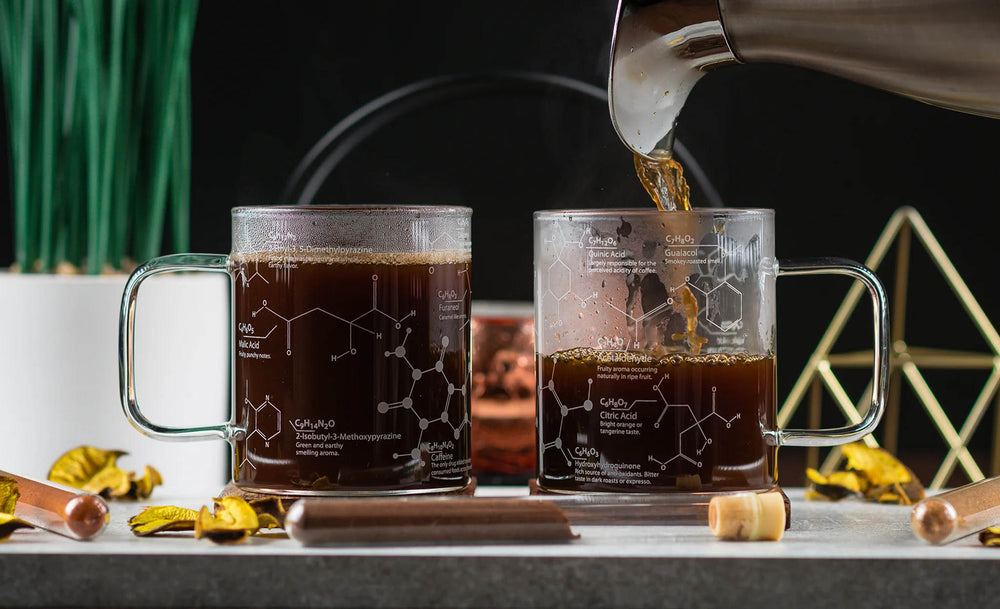 coffee pouring into science of coffee mugs