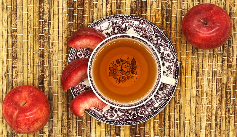 Plum Tea Brewed in Teacup w/ Plums