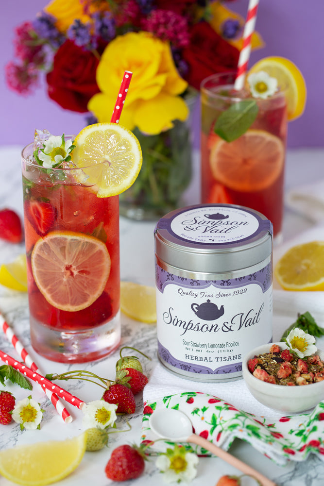 sour strawberry lemonade tea tin and iced tea scene 